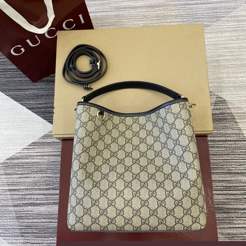 G*u*i top handle bags